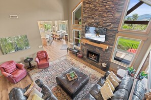 Smart TV, fireplace, video games, DVD player - Eden Dream Home · Family Retreat w/ Private Hot Tub + Theater · Sleeps 22 (Eden)