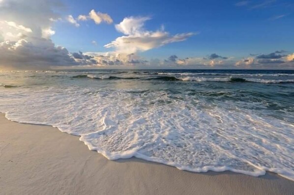 On the beach, sun-loungers, beach towels