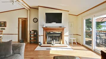 Smart TV, fireplace, DVD player, books