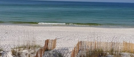 On the beach, sun-loungers, beach towels