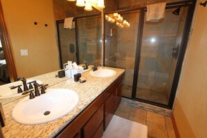 Combined shower/tub, hair dryer, towels, soap