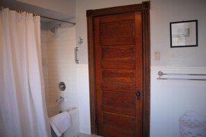 Combined shower/bathtub, hair dryer, towels, soap