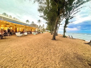 On the beach, sun loungers, beach towels