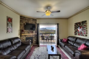 Smart TV, fireplace, DVD player, books - John's Mtn Blessing  w/ 2 Pools, Hot tub, Arcade Games 7 BR & 6 BA.  Sleeps 20+ (Pigeon Forge)