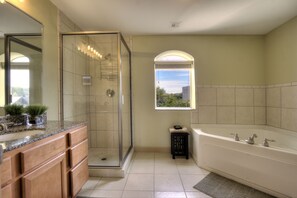 Combined shower/tub, jetted tub, hair dryer, towels - John's Mtn Blessing  w/ 2 Pools, Hot tub, Arcade Games 7 BR & 6 BA.  Sleeps 20+ (Pigeon Forge)