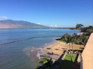 On the beach, sun-loungers, beach towels