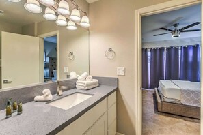 Shower, hair dryer, towels, shampoo