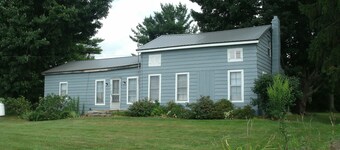 Relax among vineyards and orchards on this working grape farm.