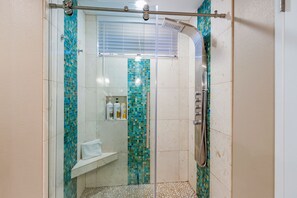Bathtub, hair dryer, towels, soap