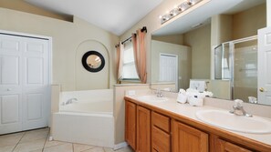 Combined shower/tub, hair dryer, towels, toilet paper