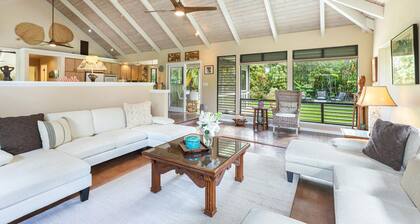 Walk to the beach in this lush, serene house with a private garden oasis