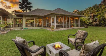 Walk to the beach in this lush, serene house with a private garden oasis