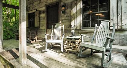 Historic Creekside Cabin with Luxury Amenities, WiFi, Fireplace, Private Trails