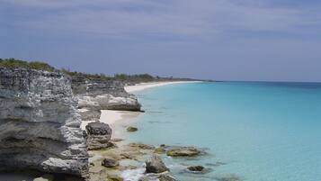 On the beach, sun loungers, beach towels