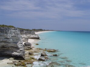 On the beach, sun loungers, beach towels