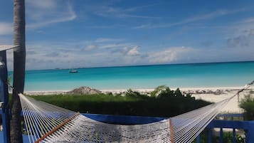 On the beach, sun-loungers, beach towels