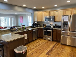 Fridge, microwave, oven, stovetop - Private Lake Access | Pet Friendly | Wi-Fi & Cable | A/C | Fire Pit | Wineries (Geneva)