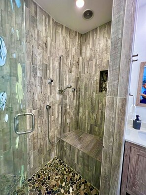 Bathtub, hair dryer, towels, soap