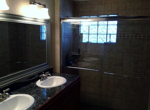 Bathtub, hair dryer, towels