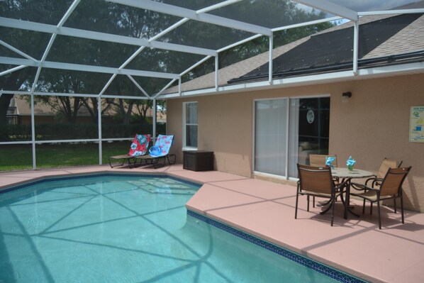 Outdoor pool, a heated pool - Orlando Villa near Disney, free Private Heated Pool, free Grill and free WiFi (Davenport)