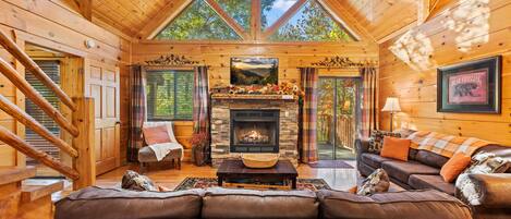 Smart-tv, een open haard, videospelletjes en een dvd-speler