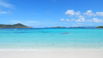 On the beach, sun-loungers, beach towels