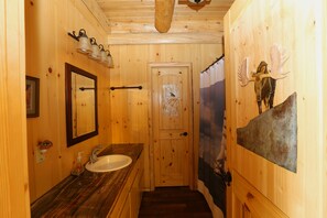 Combined shower/tub, hair dryer, towels, soap