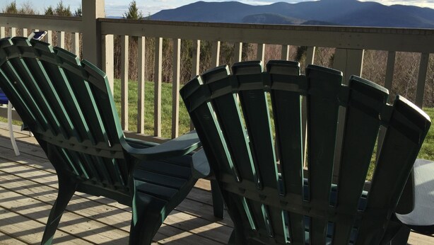 Two Adirondack chairs on a wooden deck overlooking a mountainous landscape. - Peaceful, Family Friendly, Heated Outdoor Pool, Awesome Views, Near Story Land (Bartlett)
