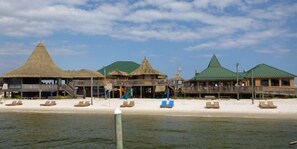 On the beach, sun-loungers, beach towels