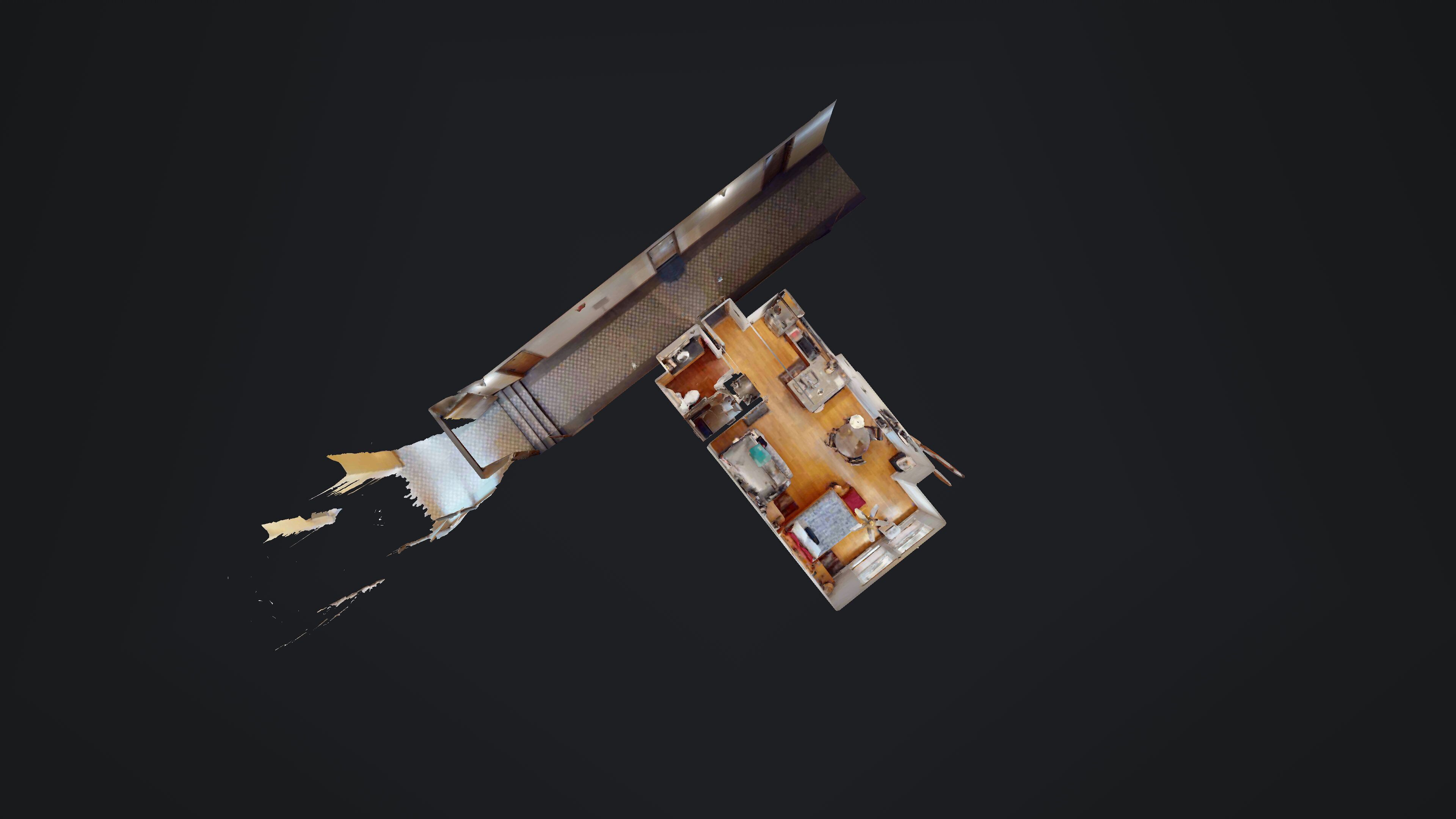 A 3D model of a hotel room layout with a bed, seating area, and a small kitchenette.