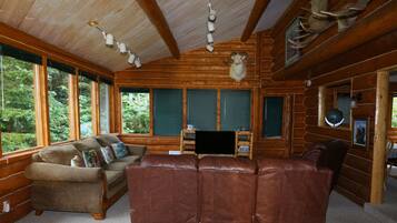 Smart TV, DVD player, foosball, books