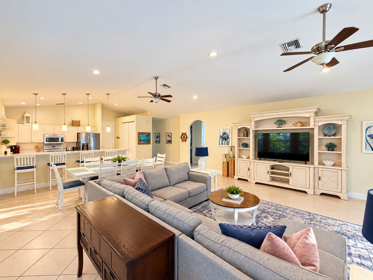 Great room with plenty of seating. 65" TV