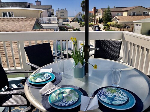 See and hear the ocean from this beautiful beach house steps from the beach. 