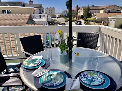See and hear the ocean from this beautiful beach house steps from the beach. 
