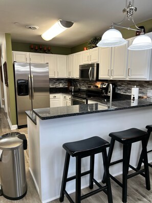 Fridge, microwave, oven, stovetop - Riverfront Spacious Luxury Condo in Perfect Location near Tanger Outlets (Sevierville)