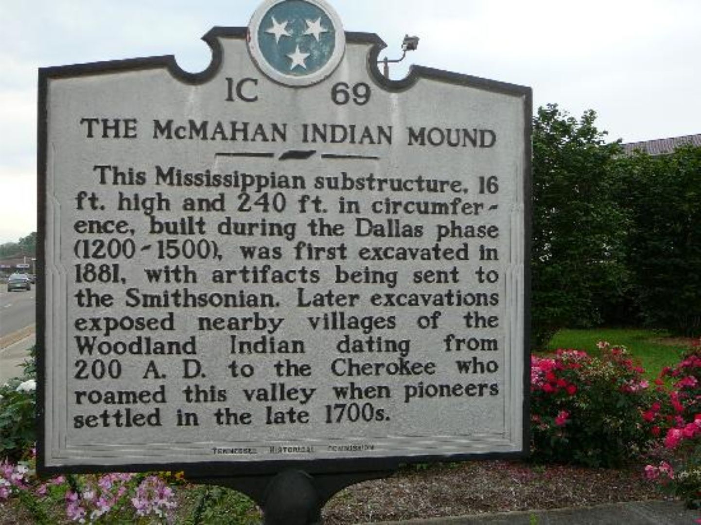 A historical marker sign for the McMahan Indian Mound, detailing its size, construction period, and historical significance.