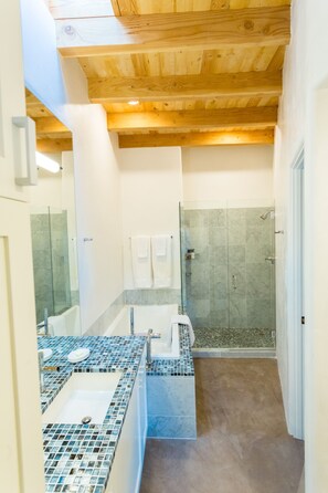 Bathtub, hair dryer, towels, soap