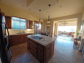 Kitchen, double oven, great view into family room picture window.