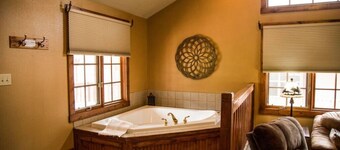 1 Bedroom suite with fireplace and jacuzzi tub.