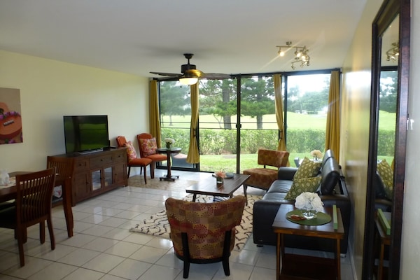 at the living room with a view to the golf course.