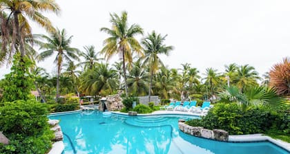 Sunrise Beach Villas - Deluxe 1 makuuhuoneen huoneisto, joka sijaitsee rannalla sijaitsevassa lomakeskuksessa