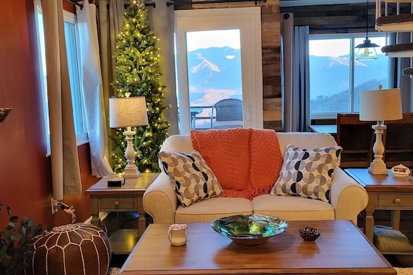 Living room toward the deck and those amazing views. Deck w/2 counter size chair