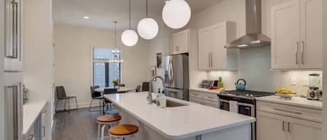 Coffee/tea maker, fridge, microwave, oven