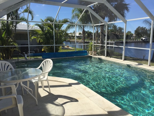 Peaceful, canal home in desirable Punta Gorda Isles. Walk to Fishermen's Village
