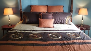A bed with a canopy, multiple pillows, and two bedside tables with lamps. - Well Appointed Home For Your Family's Enjoyment In The Heart of Charlottesville (Charlottesville)