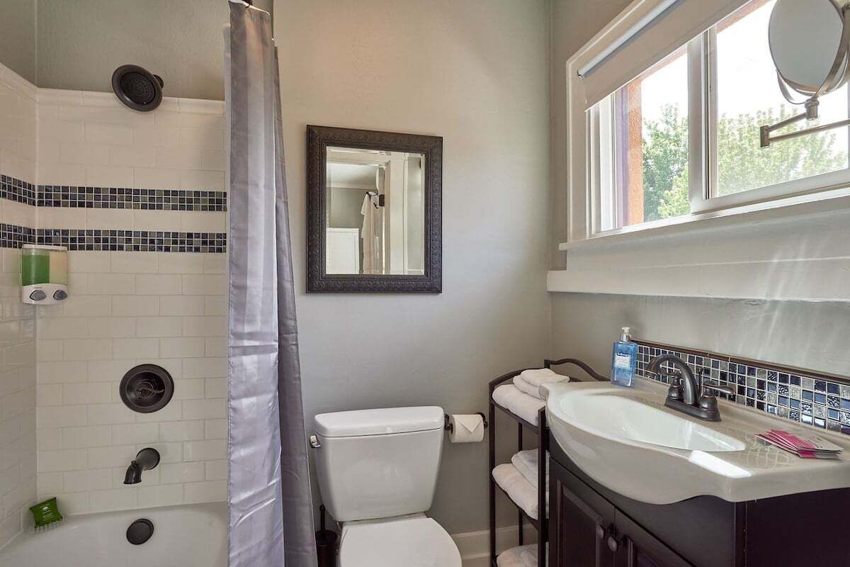 Combined shower/tub, hair dryer, towels, soap