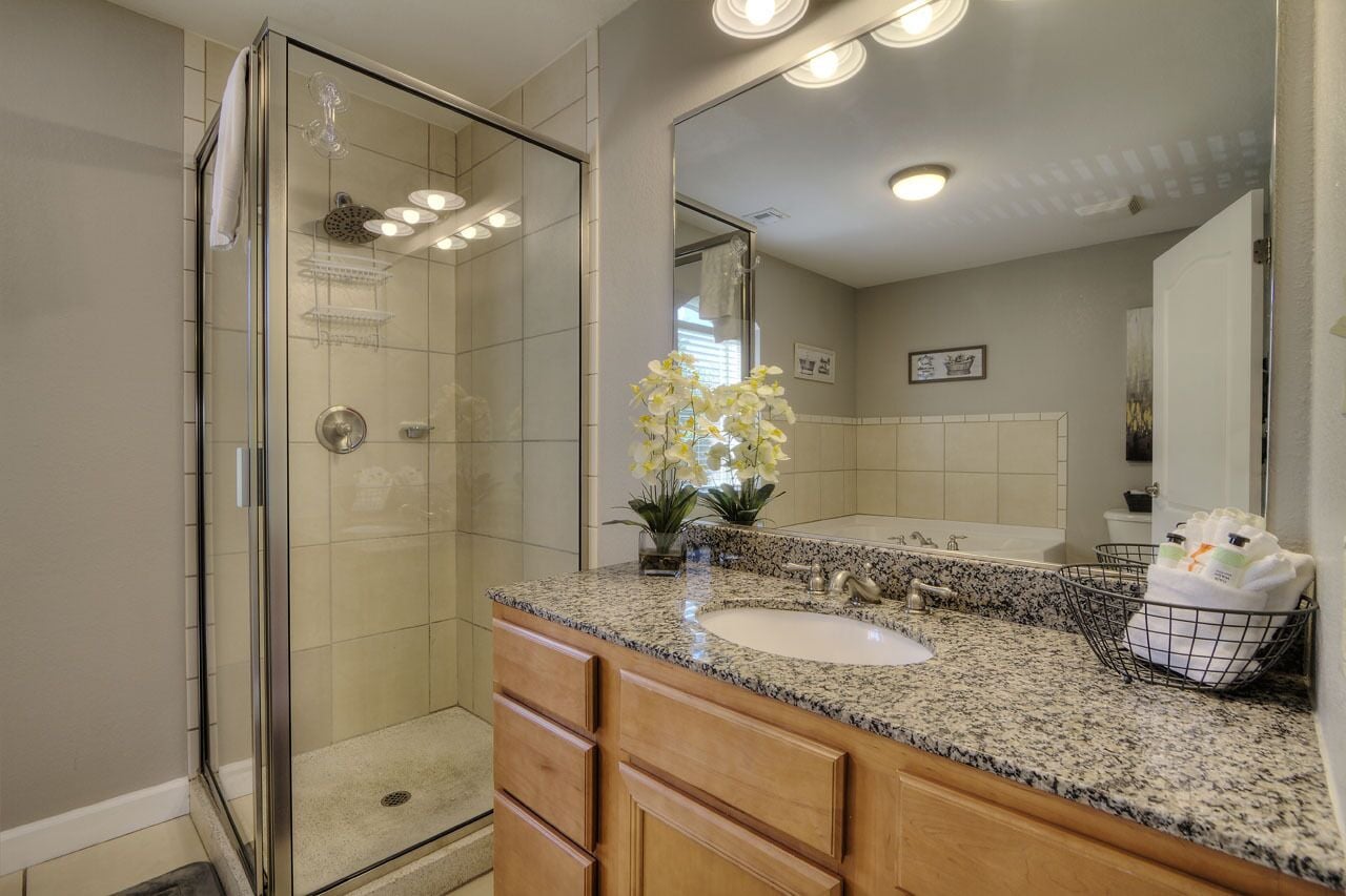 Bathtub, jetted bath, hair dryer, towels
