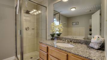Bathtub, jetted bath, hair dryer, towels