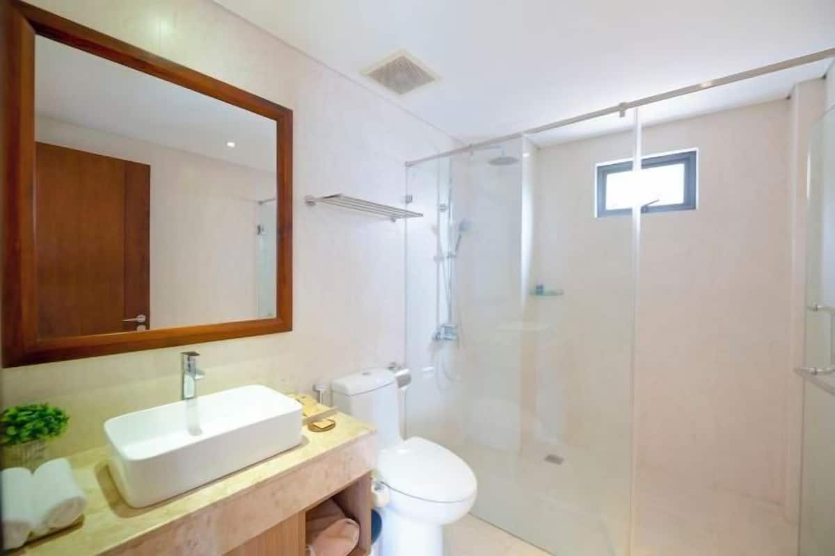 Bathroom | Shower, free toiletries, hair dryer, bathrobes