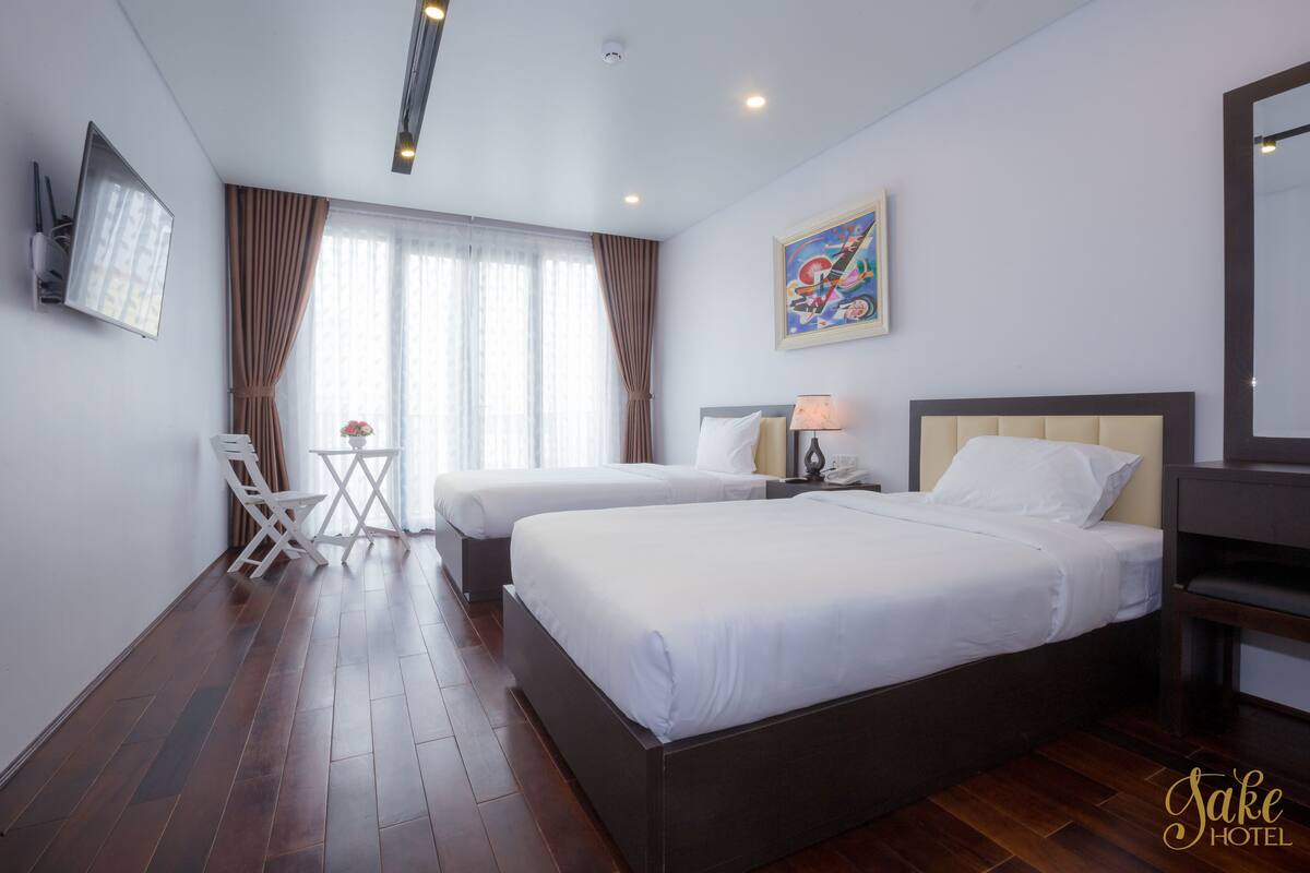 Deluxe Double or Twin Room, Balcony, City View | 1 bedroom, minibar, in-room safe, desk